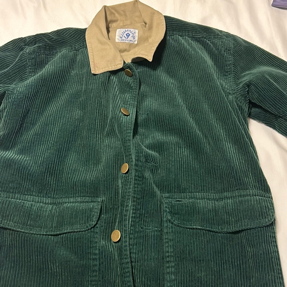 This is a vintage green corduroy jacket. Super soft and unique!